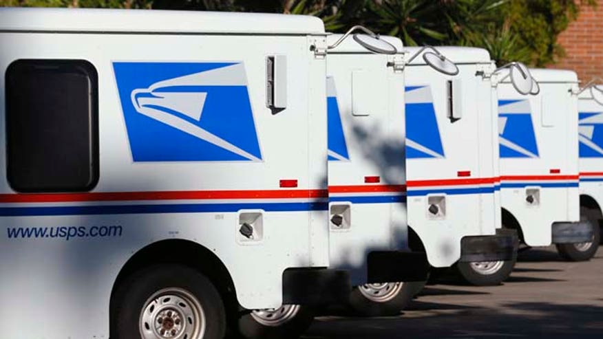 US Postal Service mail trucks_reuters_660.jpg