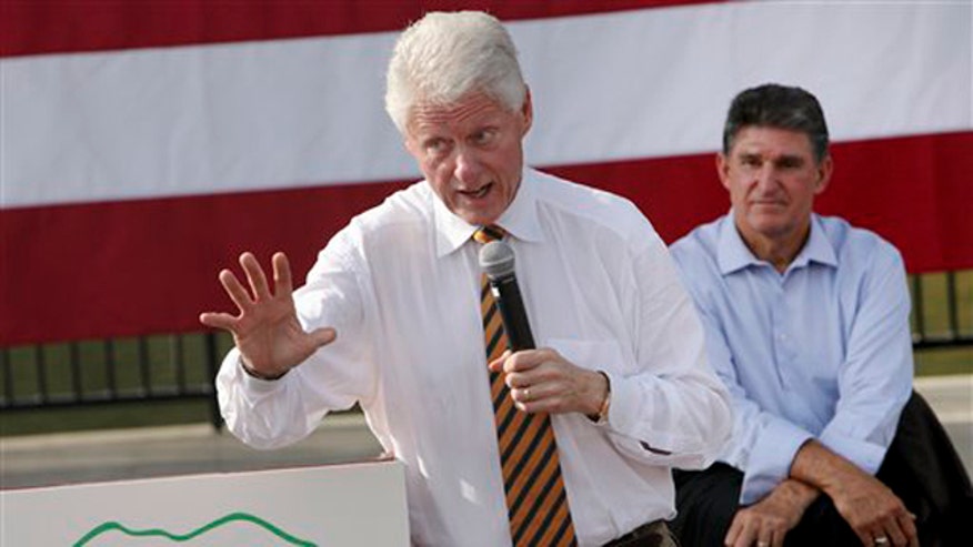 clinton_manchin_101110.jpg