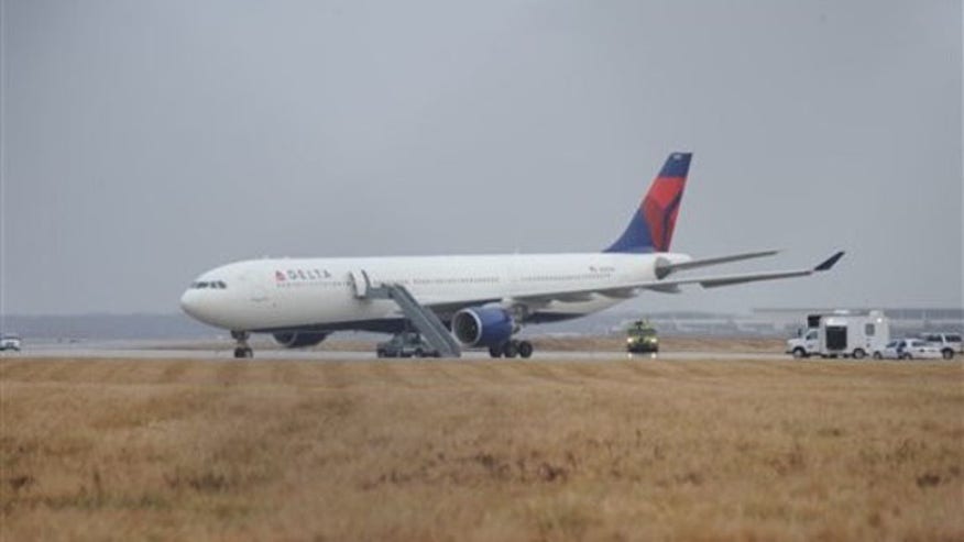 NWA Flight 253 lands at Detroit