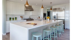 All designers and homeowners have their own ideas about what makes a great kitchen, but throughout my years in the design world, I’ve come to rely on several go-to strategies for creating a successful, functional, beautiful space. The addition of any one of these items would greatly increase the appeal of a space. Combine them all, and you’d have one spectacular dream kitchen.