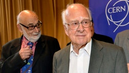 Francois Englert of Belgium and Peter Higgs of Britain won the  Nobel Prize in physics on Tuesday for their theoretical discoveries on how subatomic particles acquire mass.