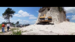 A construction company has essentially destroyed one of Belize's largest Mayan pyramids with backhoes and bulldozers to extract rock for a road-building project.