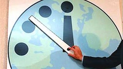The hands of the infamous Doomsday Clock will remain firmly in their place at five minutes to midnight — symbolizing humans' destruction — for the year , scientists announced Monday.