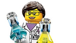 >Wearing glasses and a lab coat, and holding out two Erlenmeyer flasks, Professor C. Bodin (as her nametag reads) is Lego's first female scientist.