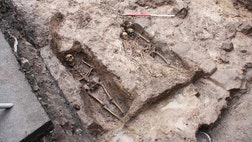   Archaeologists have unearthed skeletal remains of eight people that may be the relatives of a medieval knight discovered under a parking lot last month in Scotland.