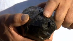 A Massachusetts man was walking along the Merrimack River when a strange-looking rock caught his attention.