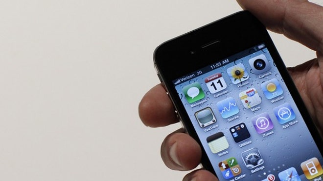 Holding iPhone