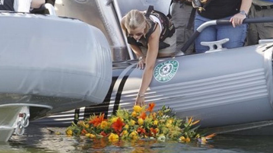 Hartley Lays Wreath
