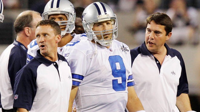 Romo hurt, helped off field