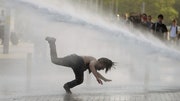 A second day of national protests over a violent police raid of an anti-development sit-in in Taksim Square has turned the Istanbul city center into a battlefield.