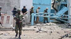 Seven Al Qaeda-linked militants on a suicide mission attacked the U.N. compound Wednesday with a truck bomb and then poured inside, killing at least  people before dying in the assault.