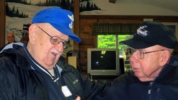 After surviving a deadly B- bomber crash and a night on a frozen mountainside, Gerald Adler, injured and frostbitten, could recall only the red handlebar mustache of his rescuer.