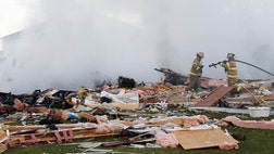 >An explosion leveled a home in northwest Ohio Tuesday morning, killing two people, injuring three and scattering debris up to a quarter-mile.