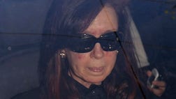 Argentina's presidential spokesman says Cristina Fernandez is in good spirits following successful surgery to remove fluid from the surface of her brain after she suffered an unexplained head injury over the summer.