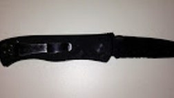 A knife carried by a Navy Seal during the raid that killed Usama bin Laden has been auctioned for more than $,.