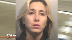 >Police southeast of Houston say a woman has been arrested for punishing her 10-year-old boy by having him walk home along a busy freeway.