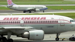 An airline statement says the captain couldn't return to the cockpit because the door was locked and that all efforts to open it, even from inside, failed during Tuesday's flight from New Delhi to the southern Indian city of Bangalore.