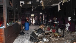 The owner of a nightclub in southern Brazil where more than  people died in a fire last weekend deflected blame to the whole country, as well as to architects and inspectors charged with making sure the building was safe, his lawyer said Wednesday.