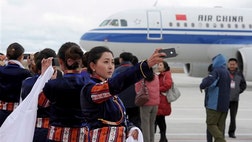 >China has begun flight operations at the world's highest civilian airport in a bid to boost tourism and tighten political control over the country's restive west.