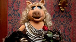 > Miss Piggy is finally joining her love, Kermit the Frog, in the Smithsonian Institution's collection of Jim Henson's Muppets, and Bert and Ernie will have a place in history, too.