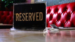 Getting into America's hot restaurants has become a sport.