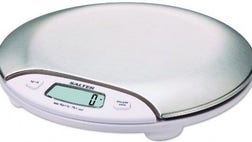 >Check out ten kitchen gadgets every home cook should have in his or her repertoire.