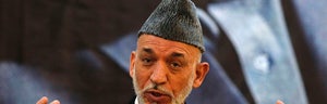 Afghan President Hamid Karzai says he will refuse peace talks with the Taliban in a newly-opened office in Qatar unless only Afghans are involved and violence stops, after the militant group claimed responsibility for an attack that killed four American troops.