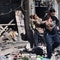 Cease-fire in Syrian city falters, aid trucks turn back