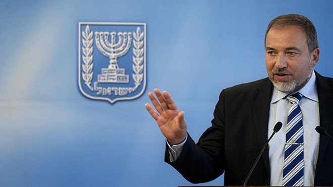 Israeli FM Avigdor Lieberman speaks at presser AP