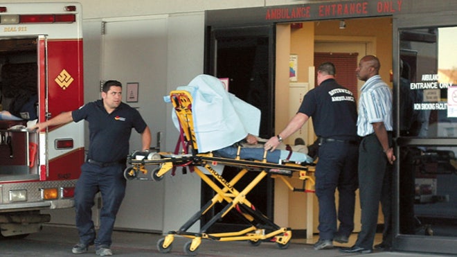 Ariz. deputy shot. Hospital stretcher scene