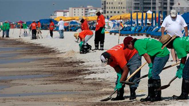 Oil Cleanup in Orange Beach, Ala.