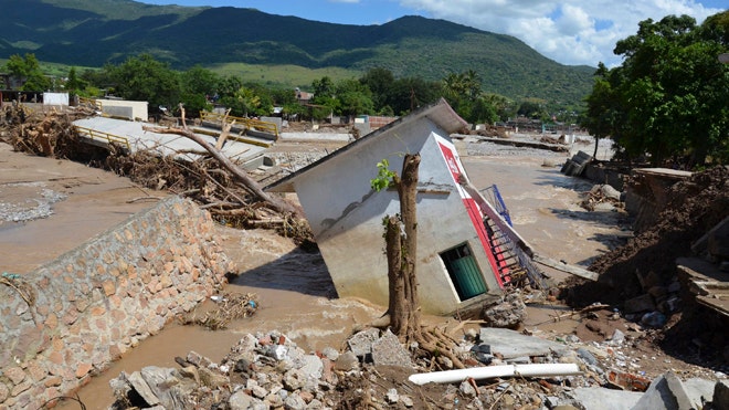 Searchers have found  more bodies of victims from twin storms that struck the country's Pacific and Gulf coasts at the same time last month, raising the death toll to , Mexico's government said Wednesday.