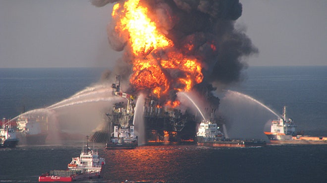 Fire boats battle oil rig explosion