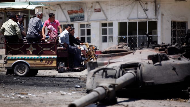syria_destroyed_tank.jpg