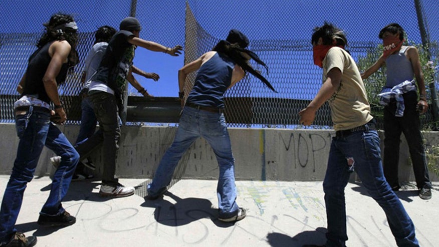 Breaking through the border fence