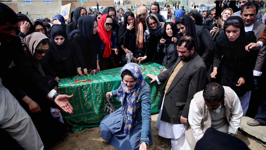 Afghanistan-womanbeatenmob.jpg