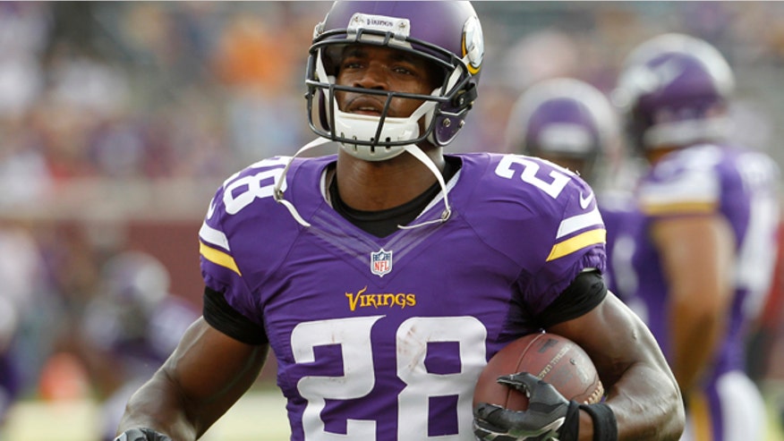 adrian-peterson-091214.jpg