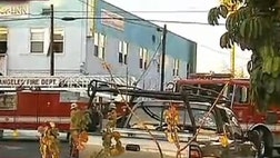 Fire roared through a -year-old residential hotel in Los Angeles' harbor area early Tuesday, injuring  people, three of them critically.