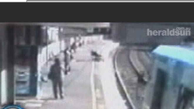 Baby Falls on Train Tracks
