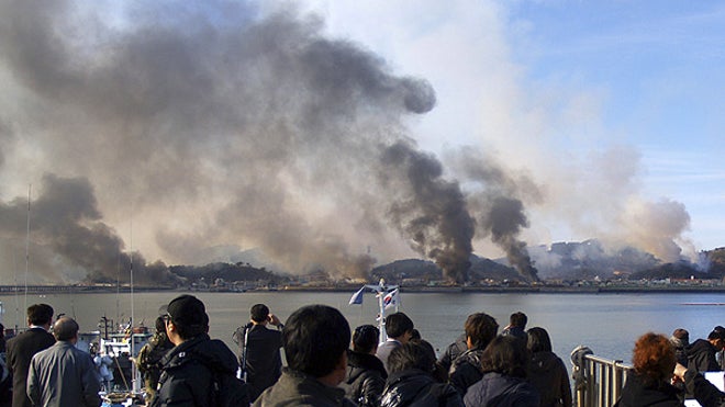 SKoreans watch island burn