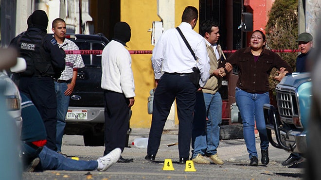 Mex woman reacts to relative killed