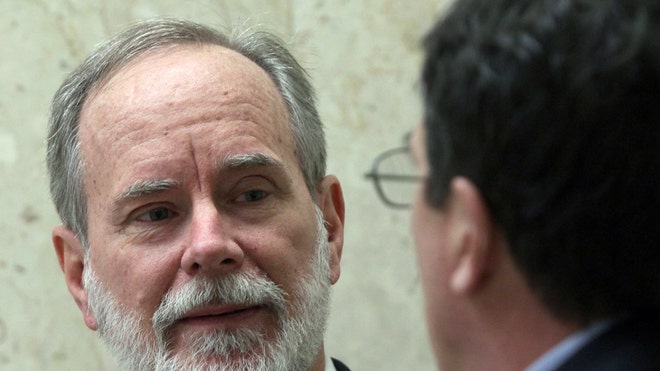 David Coppedge NASA scientist outside LA court with attorney AP