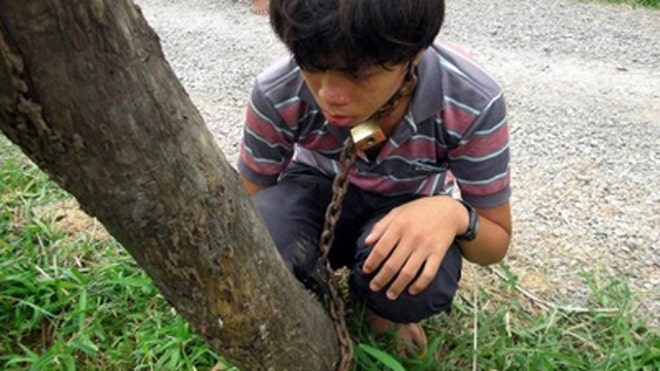 cambodian_boy_tree.jpg