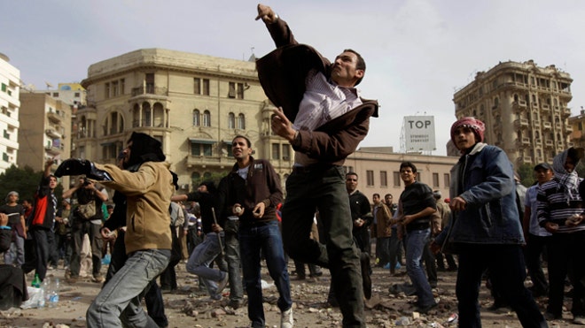 Protestors hurl rocks in Cairo