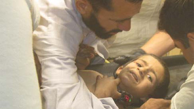 Afghan boy forced to step on bomb