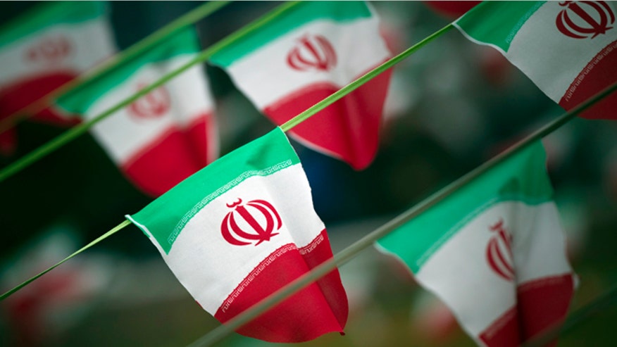 RTR2XM4A_iranflags660.jpg