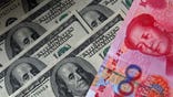 China's commerce minister said Wednesday that a U.S. trade bill targeting Chinese imports goes against international rules and that Beijing will not adjust the value of its currency.