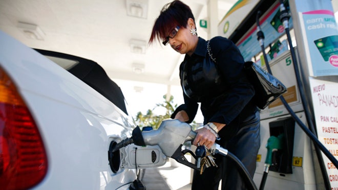 Woman-Filling-Car-Gas-BP