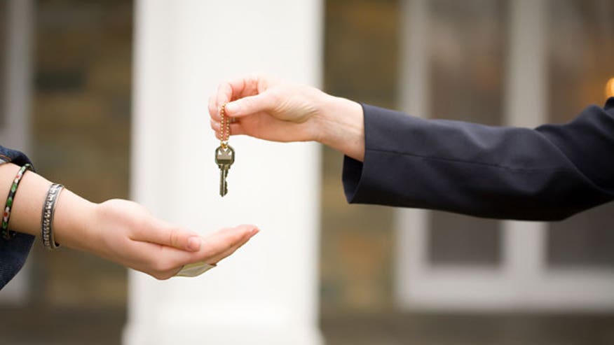 Keys-Handed-Off-Home-Auto-Sale
