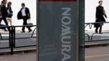 Nomura Holdings  said on Friday that Italian prosecutors had ordered a unit's assets in Italy frozen in relation to an ongoing legal dispute over a derivates financing deal with Italian bank Monte Dei Paschi .